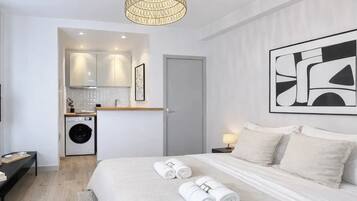 Superior Apartment, Courtyard View | Living area | 80-cm Smart TV with digital channels