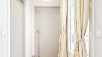 Superior Apartment, Courtyard View | Living area | 80-cm Smart TV with digital channels