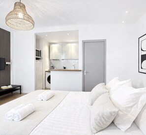 Superior Apartment, Courtyard View | Living area | 80-cm Smart TV with digital channels