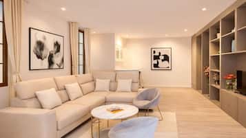 Deluxe Apartment, Courtyard View | Living area | 107-cm Smart TV with digital channels