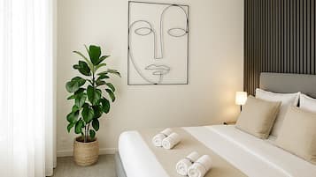 Deluxe Apartment, Courtyard View | Iron/ironing board, travel crib, free WiFi, bed sheets