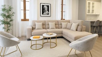 Deluxe Apartment, Courtyard View | Living area | 107-cm Smart TV with digital channels