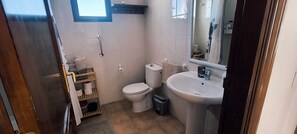 Hair dryer, towels, soap, toilet paper