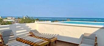 Central 4-bedroom, 3 bath Condo with WiFi, AC in fantastic Puerto Morelos