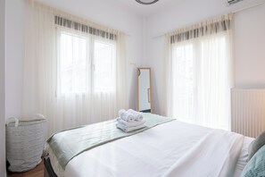 Apartment, 2 Bedrooms, Kitchen, City View | In-room safe, desk, laptop workspace, blackout drapes
