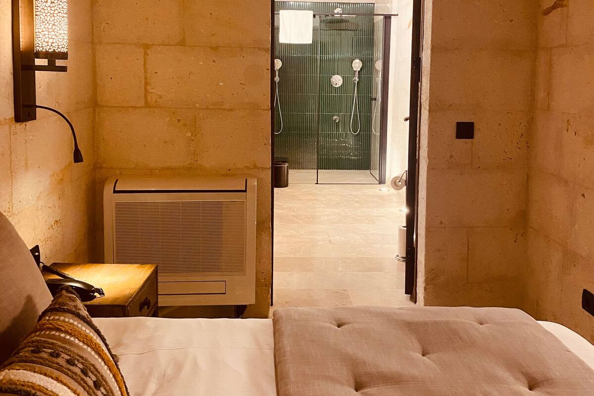 Deluxe Suite, Courtyard View | In-room safe, desk, laptop workspace, blackout drapes