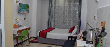 1 slaapkamer, een strijkplank/strijkijzer, wifi, beddengoed