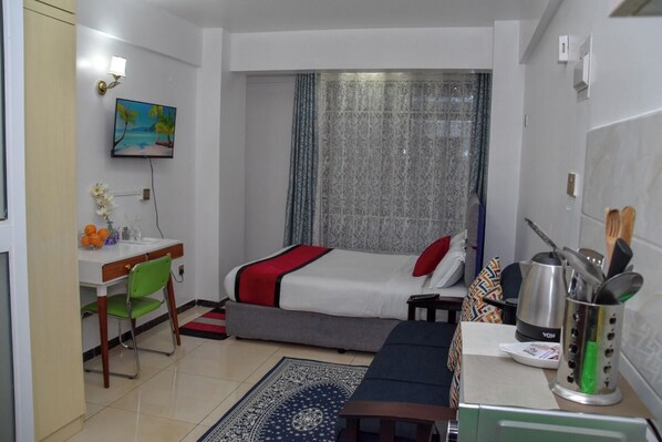 1 habitación, tabla de planchar con plancha, wifi y ropa de cama