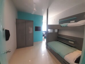 Deluxe Quadruple Room | Premium bedding, memory-foam beds, desk, free WiFi