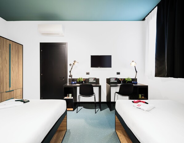 Habitación Deluxe con 1 cama matrimonial o 2 individuales | Escritorio, espacio para trabajar con laptop y wifi gratis 