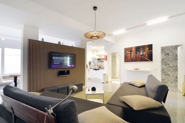 Wohnzimmer mit 2 vollwertigen Betten (werden tagsüber als Couch genutzt)