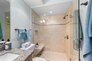 Shower, hair dryer, towels, soap