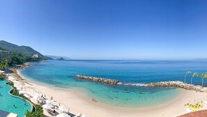 On the beach, sun-loungers, beach towels