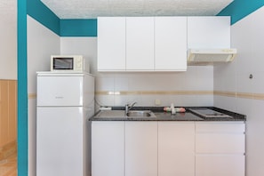 Fridge, microwave, toaster, cookware/dishes/utensils