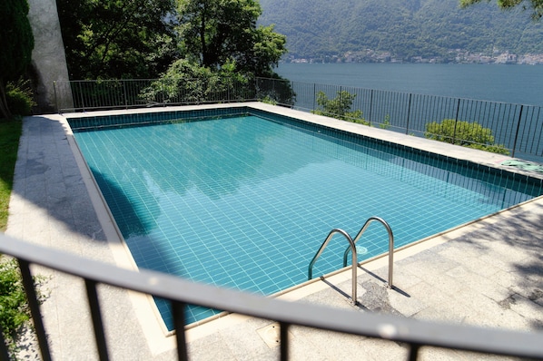 Apartment, Patio, Lake View | Iron/ironing board, cribs/infant beds, free WiFi, bed sheets