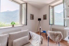 Apartment, Patio, Lake View | Iron/ironing board, cots/infant beds, free WiFi, bed sheets