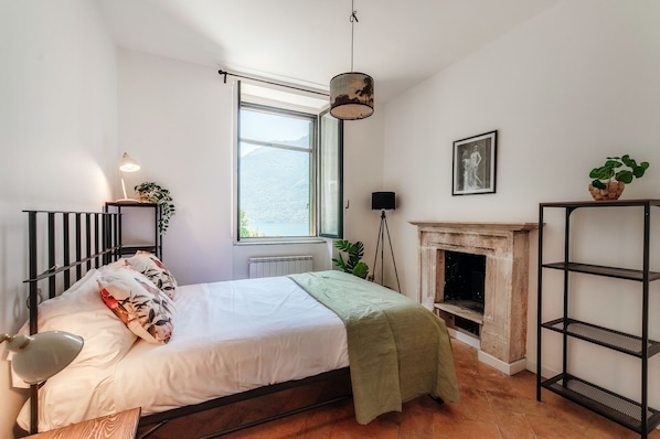 Apartment, Patio, Lake View | Iron/ironing board, cots/infant beds, free WiFi, bed sheets