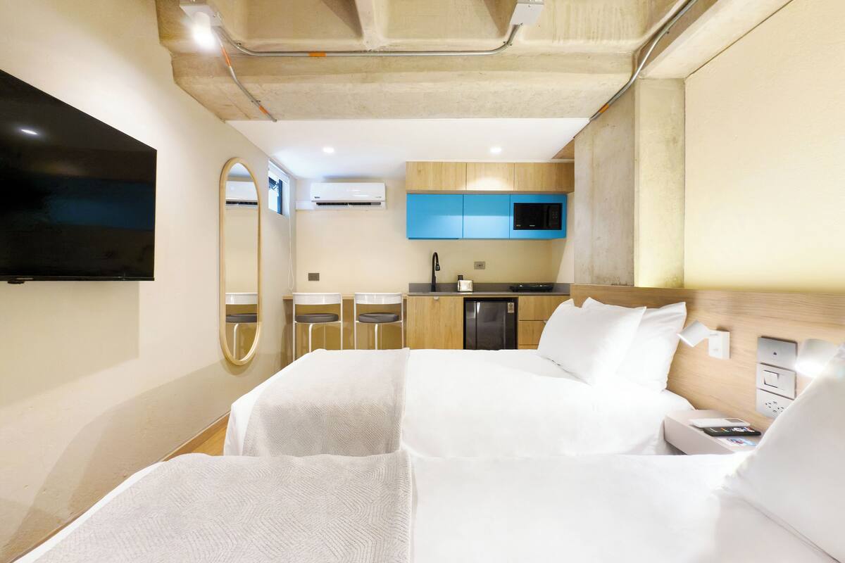 Premium bedding, in-room safe, blackout curtains, iron/ironing board