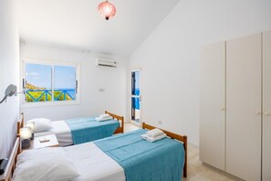 4 habitaciones, tabla de planchar con plancha, wifi y ropa de cama 