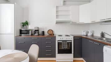 Basic Apartment, Balcony, Courtyard View | Private kitchen | Full-sized fridge, microwave, oven, stovetop
