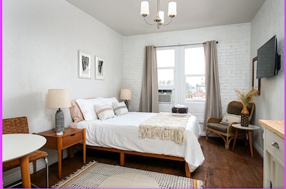 Studio with Exposed Brick & Modern Comfort in LA