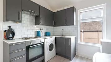 Fridge, oven, cookware/dishes/utensils