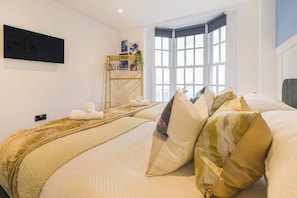 2 chambres, fer et planche à repasser, Wi-Fi, draps fournis