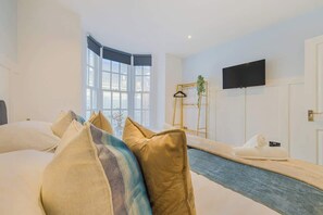 2 habitaciones, tabla de planchar con plancha, wifi y ropa de cama 