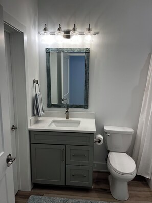 Shower, towels, soap, toilet paper