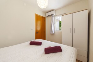 2 bedrooms, cots/infant beds, bed sheets