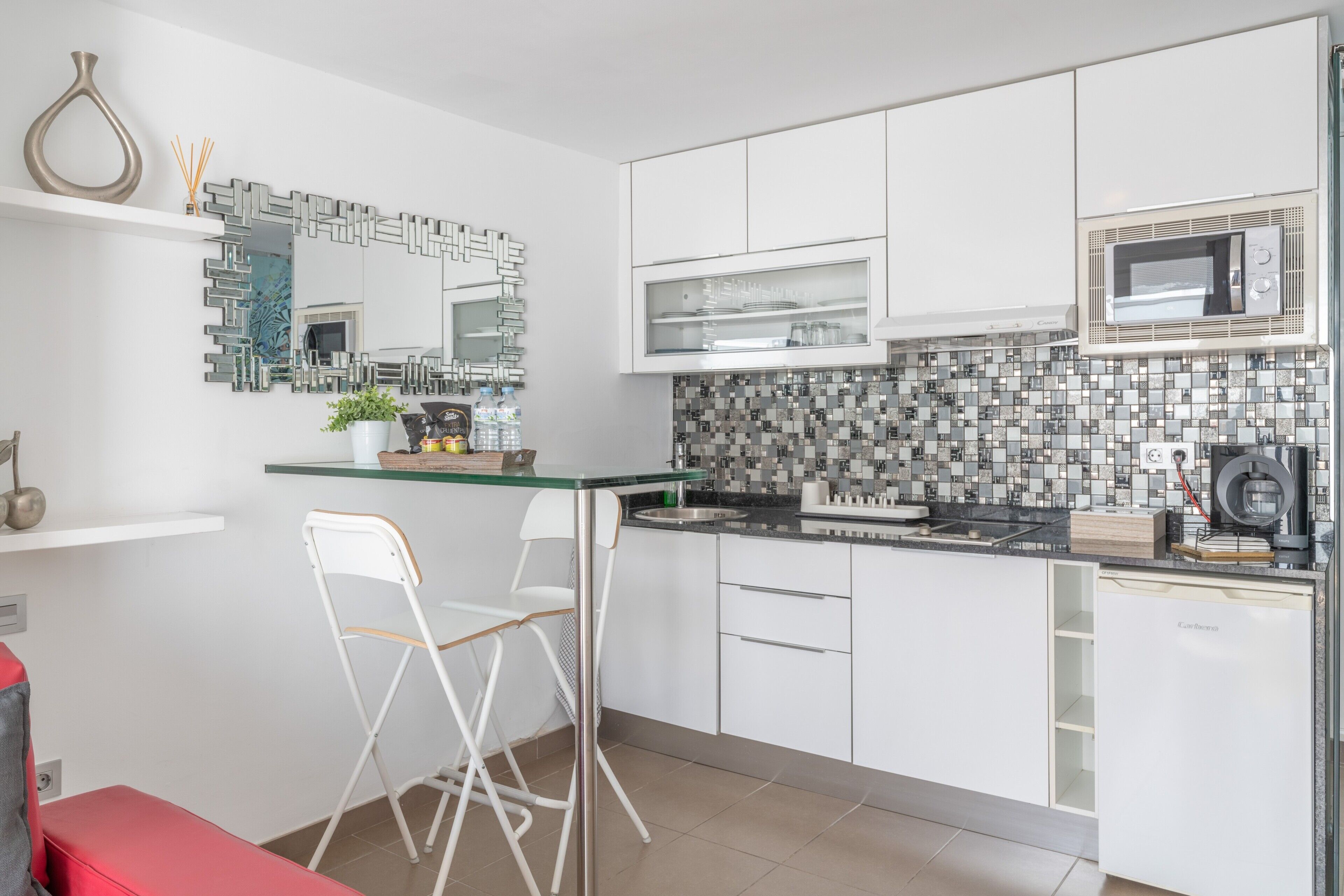 Fridge, microwave, stovetop, coffee/tea maker