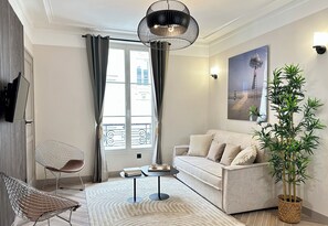 Deluxe Apartment, City View | Living area - 836 StDominique (Paris)
