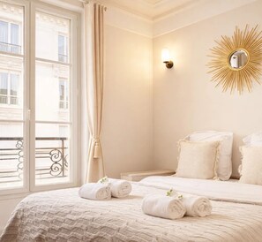 Deluxe Apartment, City View | Living area | 80-cm Smart TV with digital channels