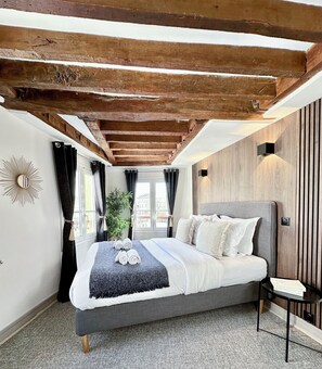 Appartement Supérieur, vue ville | Fer et planche à repasser, lit parapluie, Wi-Fi gratuit, draps fournis