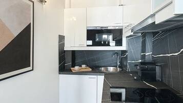 Superior-huoneisto, kaupunkinäköala | Yksityinen keittiö | Espressokone, vedenkeitin, leivänpaahdin, pakastin