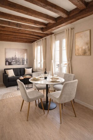 Superior Apartment, City View | Living area | 80-cm Smart TV with digital channels