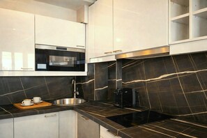 Superior Apartment, City View | Private kitchen | Espresso maker, electric kettle, toaster, freezer - 841 Polytech (Paris)