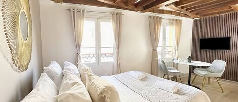 Superior Apartment, City View | Living area | 80-cm Smart TV with digital channels