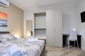 1 habitación, tabla de planchar con plancha, wifi y ropa de cama 
