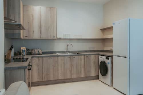 Apartment | Private kitchen | Electric kettle, dining tables