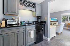 Microwave, coffee/tea maker, toaster, cookware/dishes/utensils