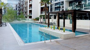 Pool - Airstay | Luxurious 2BR + Guest Room | City Walk (Dubai)