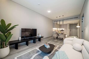 TV, offices - Airstay | Premium 1BR | Next to Circle Mall | JVC (دبي)