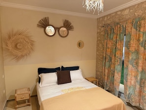 Blackout drapes, soundproofing, iron/ironing board, free WiFi
