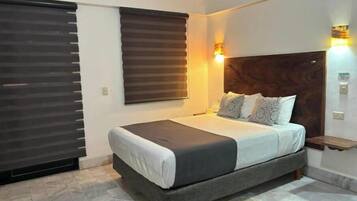 1 dormitorio, tabla de planchar con plancha, Internet y ropa de cama