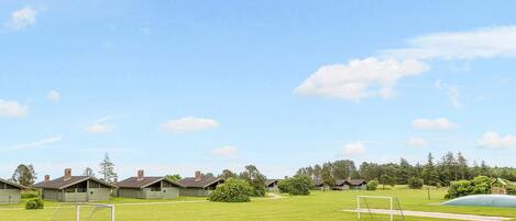 Maison | Terrain de sport