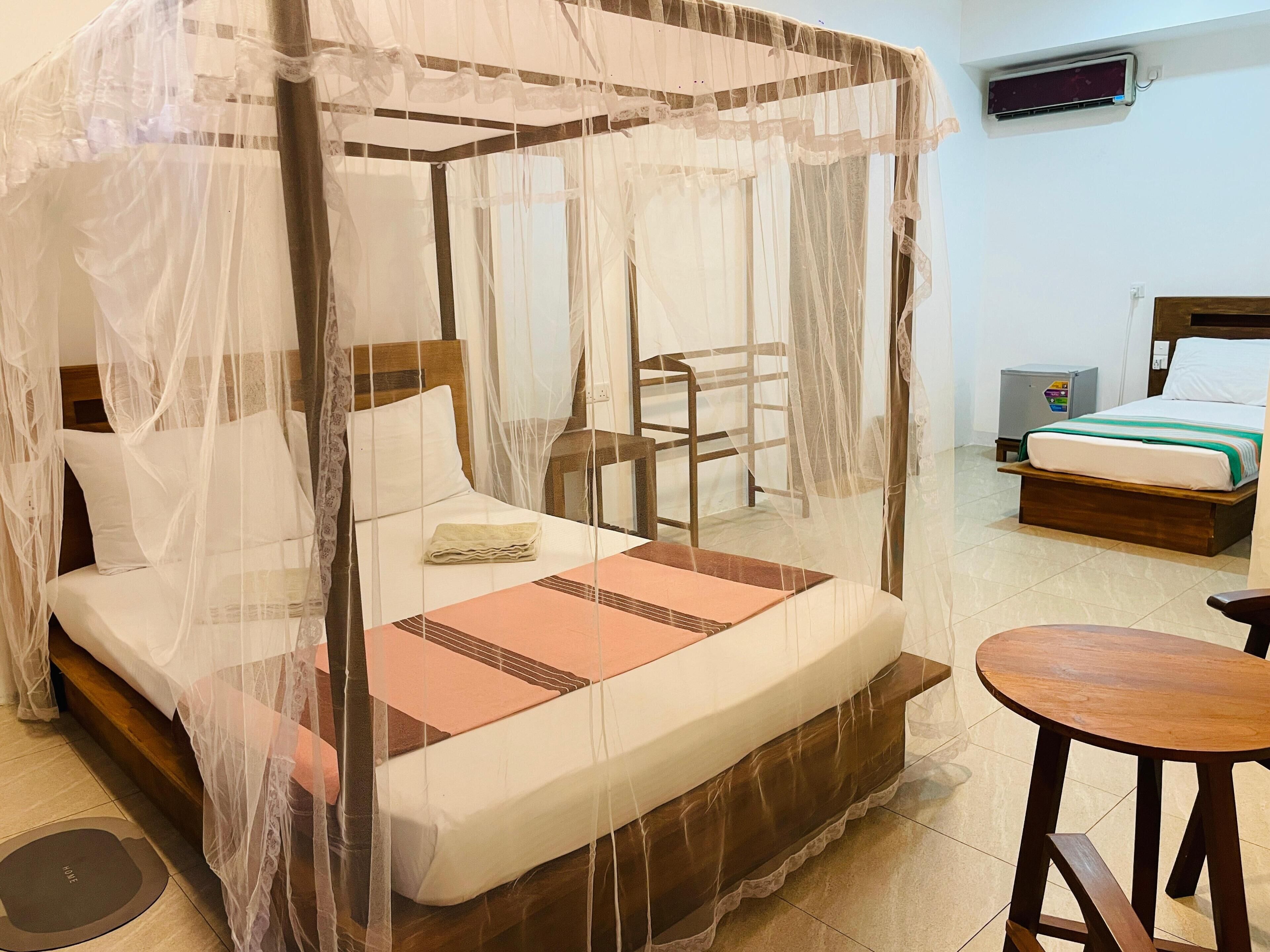 Deluxe Double Room, Garden View, Ground Floor | Premium bedding, minibar, in-room safe, individually decorated