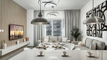 Exclusive Apartment, Canal View | Living area | 55-inch Smart TV with digital channels, Netflix, streaming services