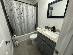 Hair dryer, towels, soap, toilet paper