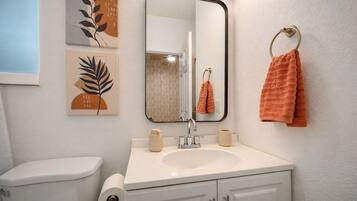 Hair dryer, towels, soap, toilet paper